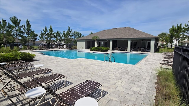 12009 Walmsley Aly, Winter Garden, FL 34787 - community pool with a patio area