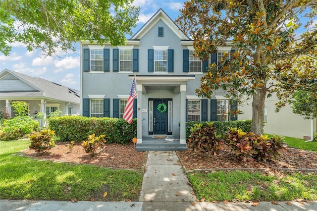 5032 Beach River Rd, Windermere, FL 34786 - view of front of property with stucco siding