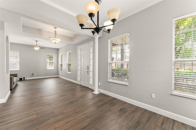 5032 Beach River Rd, Windermere, FL 34786 - foyer entrance featuring baseboards, dark wood finished floors, a chandelier, and crown molding