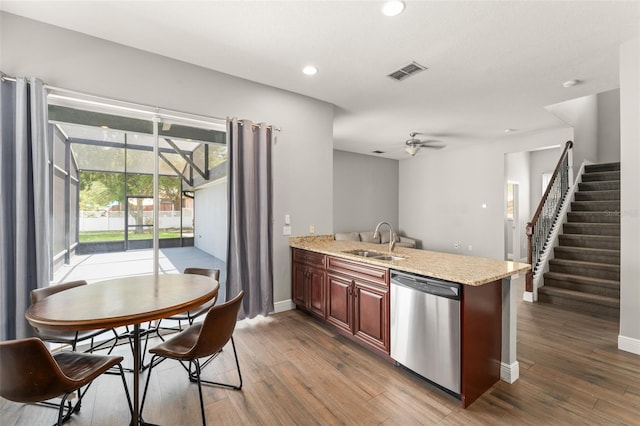 5032 Beach River Rd, Windermere, FL 34786 - kitchen featuring stainless steel dishwasher, a sink, ceiling fan, a peninsula, and dark wood-style flooring