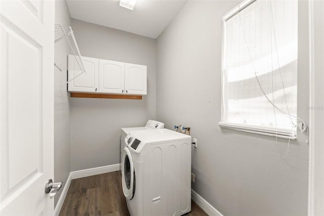 5032 Beach River Rd, Windermere, FL 34786 - laundry area featuring separate washer and dryer, dark wood finished floors, cabinet space, and baseboards