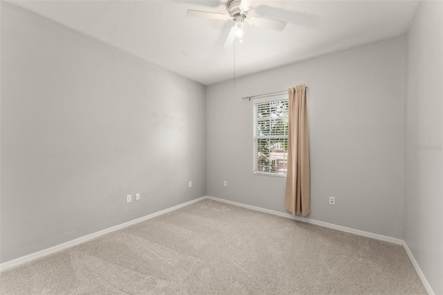 5032 Beach River Rd, Windermere, FL 34786 - carpeted empty room with baseboards and a ceiling fan