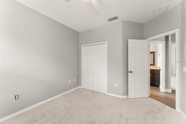 5032 Beach River Rd, Windermere, FL 34786 - unfurnished bedroom with carpet flooring, a closet, baseboards, and ceiling fan