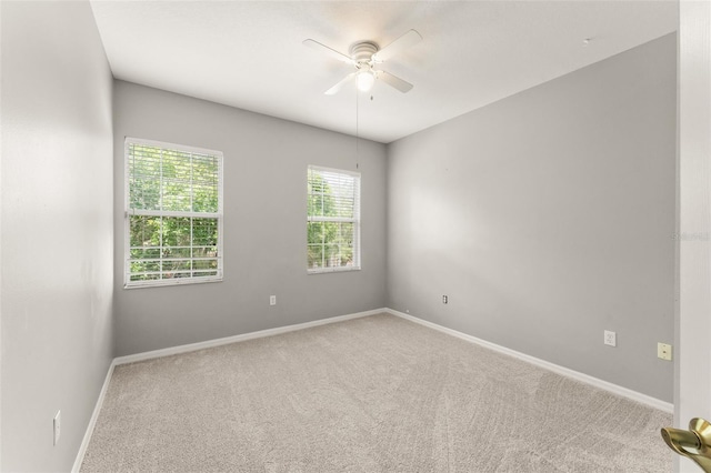 5032 Beach River Rd, Windermere, FL 34786 - empty room featuring ceiling fan, carpet, and baseboards