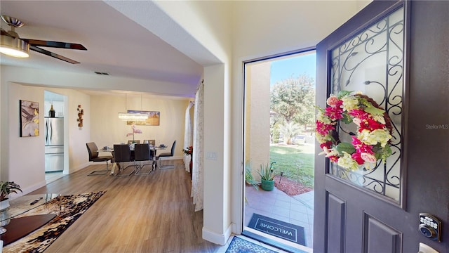 3044 Camino Real Dr S, Kissimmee, FL 34744 - foyer with wood finished floors and a ceiling fan