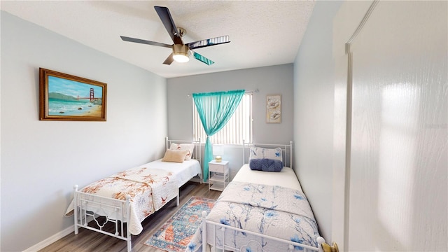 3044 Camino Real Dr S, Kissimmee, FL 34744 - bedroom with wood finished floors and a ceiling fan