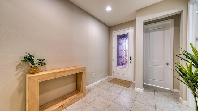 600 Buchannan Dr, Davenport, FL 33837 - foyer entrance with baseboards and light tile patterned floors
