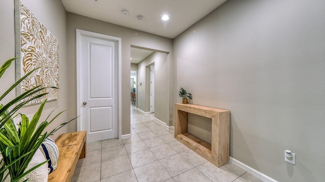 600 Buchannan Dr, Davenport, FL 33837 - corridor featuring light tile patterned flooring and baseboards