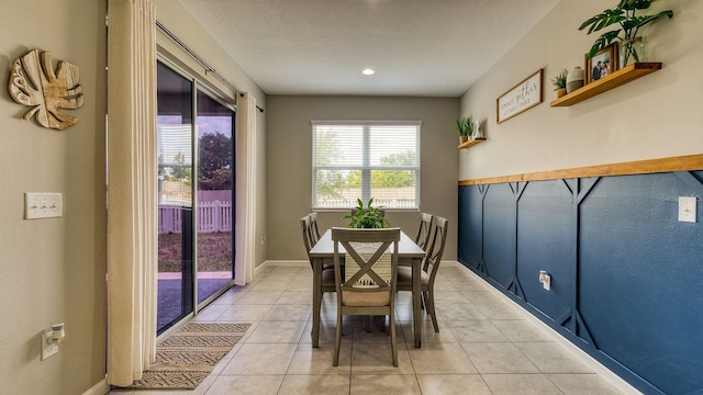 600 Buchannan Dr, Davenport, FL 33837 - dining space featuring light tile patterned floors and baseboards