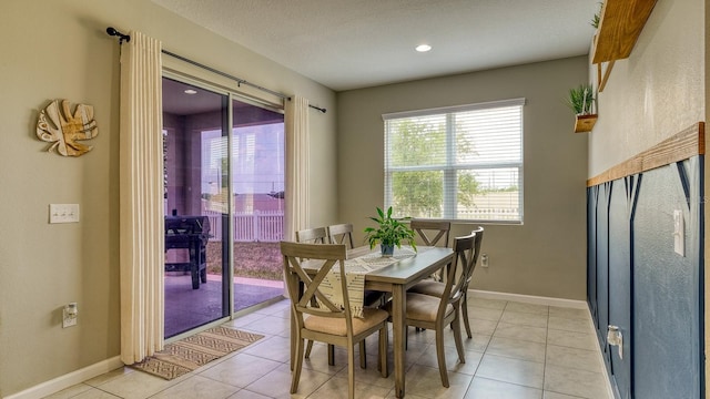 600 Buchannan Dr, Davenport, FL 33837 - dining area featuring light tile patterned floors and baseboards