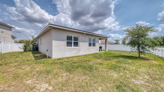600 Buchannan Dr, Davenport, FL 33837 - back of house with stucco siding