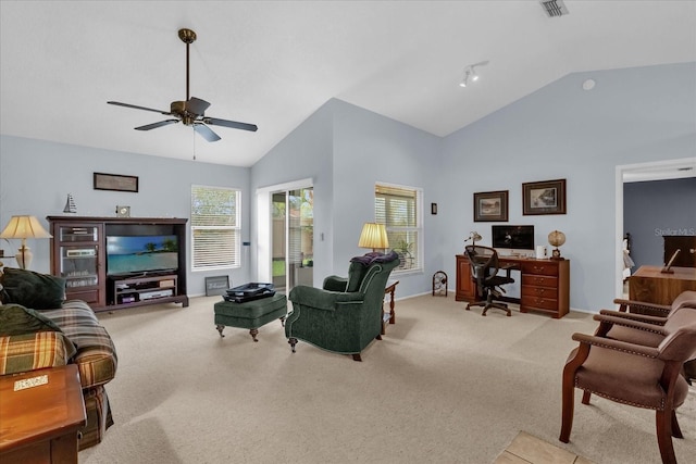 2344 Whispering Maple Dr, Orlando, FL 32837 - living area featuring healthy amount of natural light, light colored carpet, an office area, ceiling fan, and high vaulted ceiling