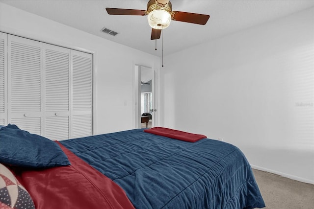 2344 Whispering Maple Dr, Orlando, FL 32837 - carpeted bedroom with baseboards, a closet, and ceiling fan