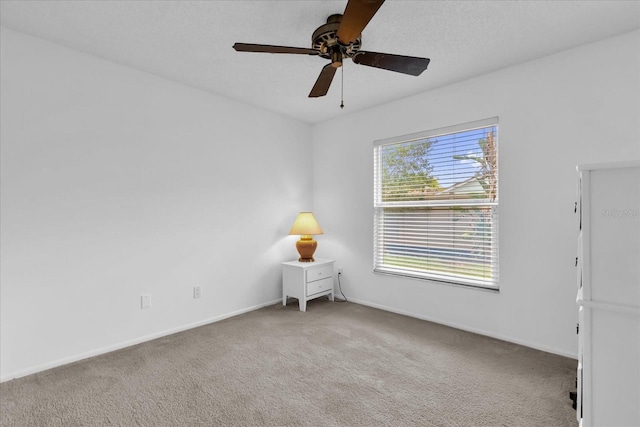 2344 Whispering Maple Dr, Orlando, FL 32837 - carpeted spare room featuring a ceiling fan and baseboards