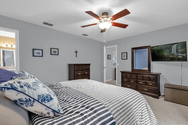 2344 Whispering Maple Dr, Orlando, FL 32837 - bedroom featuring carpet floors, a ceiling fan, and a textured ceiling