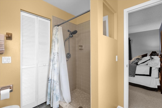 2344 Whispering Maple Dr, Orlando, FL 32837 - full bathroom with a closet and a tile shower