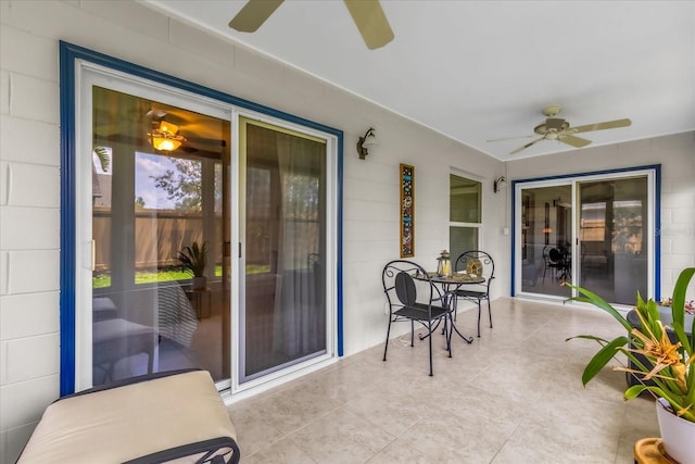 2344 Whispering Maple Dr, Orlando, FL 32837 - sunroom / solarium featuring a ceiling fan and tile patterned floors