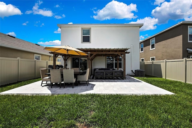 rear view of house featuring stucco siding, central air condition unit, a patio, and a pergola