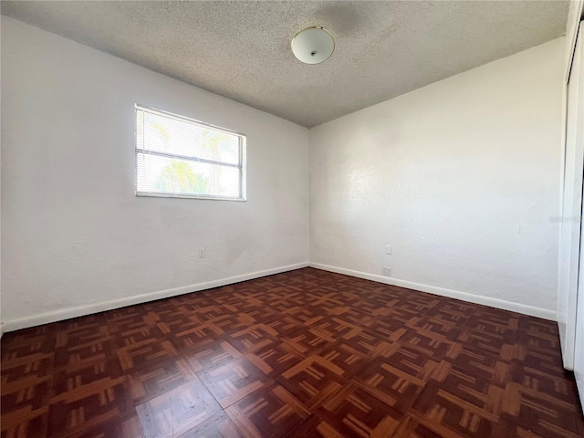 501 Las Palmas Cir Unit 676, Avon Park, FL 33825 - empty room featuring a textured ceiling and baseboards