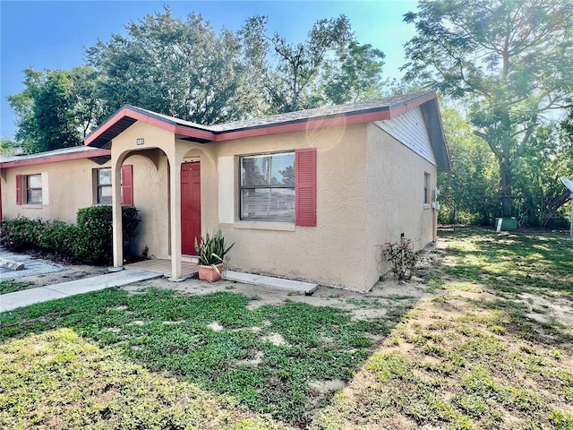 501 Las Palmas Cir Unit 676, Avon Park, FL 33825 - view of front of house featuring stucco siding
