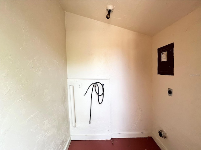 501 Las Palmas Cir Unit 676, Avon Park, FL 33825 - washroom featuring baseboards and hookup for an electric dryer