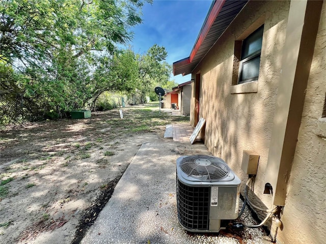 501 Las Palmas Cir Unit 676, Avon Park, FL 33825 - view of yard with central AC unit