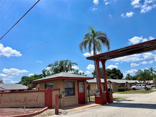 501 Las Palmas Cir Unit 676, Avon Park, FL 33825 - community / neighborhood sign featuring a gate