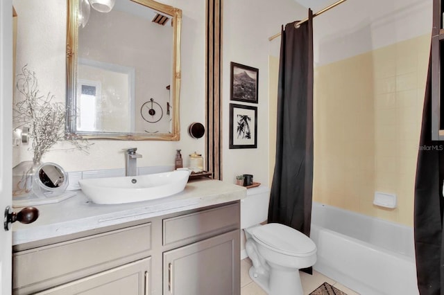 10293 Cypress Knee Cir, Orlando, FL 32825 - bathroom with vanity, toilet, shower / bath combo, and tile patterned floors
