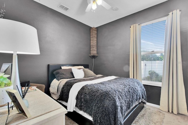 10293 Cypress Knee Cir, Orlando, FL 32825 - bedroom with carpet, ceiling fan, and baseboards