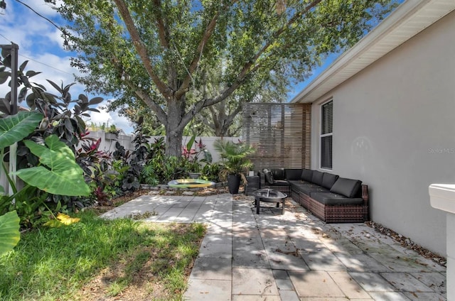 10293 Cypress Knee Cir, Orlando, FL 32825 - fenced backyard featuring a patio and outdoor lounge area