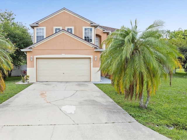 437 Bridgewater Ct, Kissimmee, FL 34758 - view of front of house featuring stucco siding, driveway, a front yard, and an attached garage