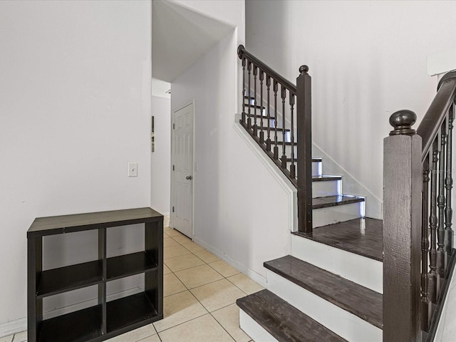 437 Bridgewater Ct, Kissimmee, FL 34758 - staircase with tile patterned flooring and baseboards