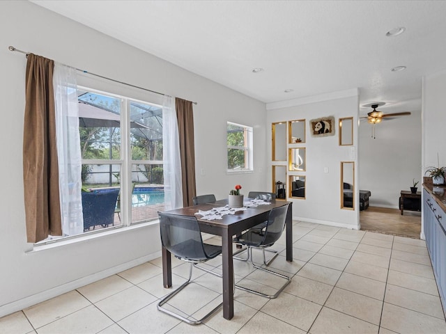 437 Bridgewater Ct, Kissimmee, FL 34758 - dining room with light tile patterned floors, baseboards, ceiling fan, and recessed lighting