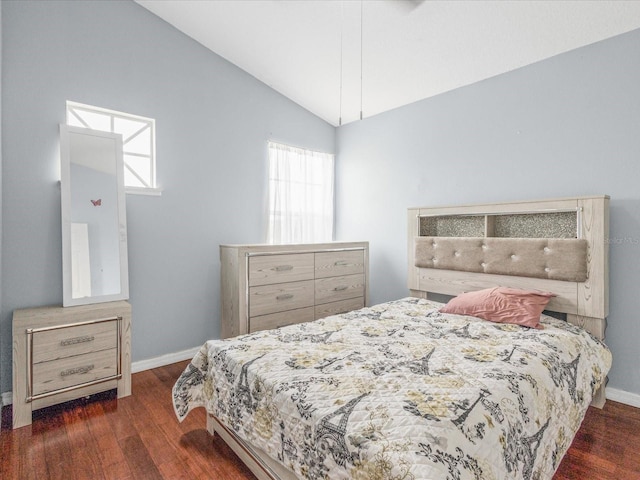437 Bridgewater Ct, Kissimmee, FL 34758 - bedroom featuring wood finished floors, baseboards, and lofted ceiling