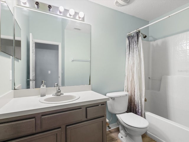 437 Bridgewater Ct, Kissimmee, FL 34758 - full bathroom with toilet, shower / tub combo with curtain, and vanity