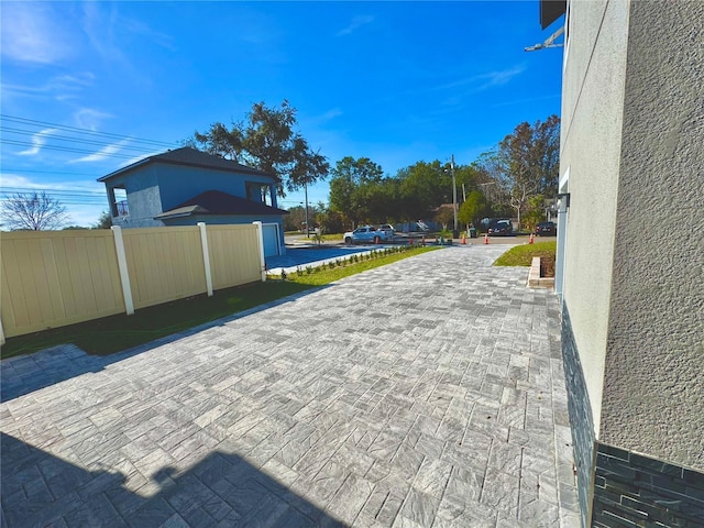 107 Grove St, Orlando, FL 32835 - view of decorative driveway with street lighting