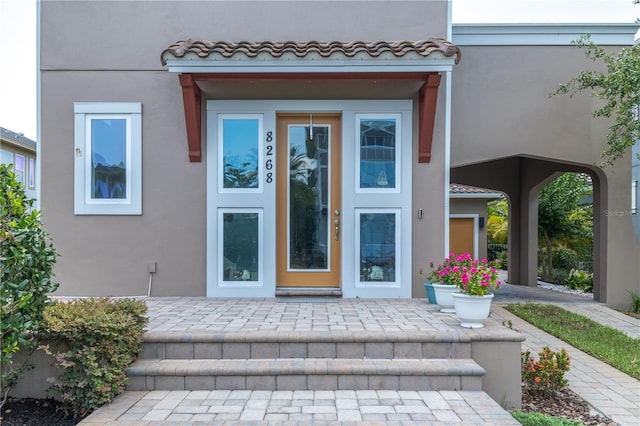 8268 Bellow St, Orlando, FL 32827 - entrance to property with stucco siding