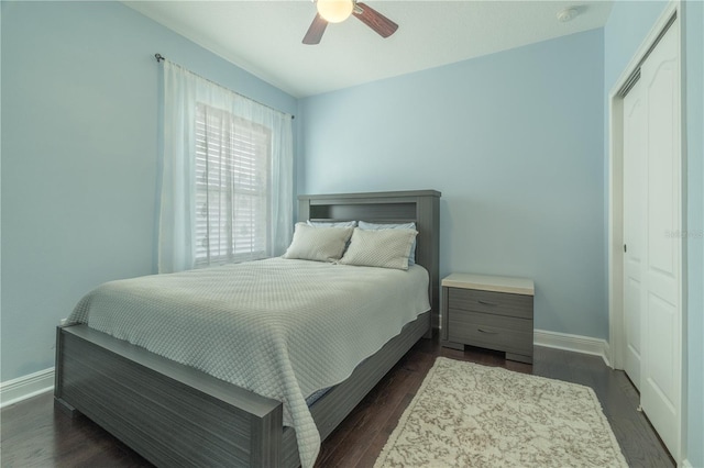 8268 Bellow St, Orlando, FL 32827 - bedroom with baseboards, dark wood-style floors, and a ceiling fan