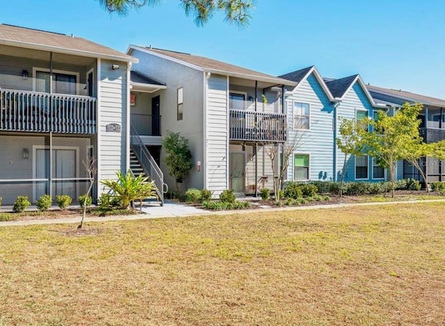 3772 Idlebrook Cir Unit 100, Casselberry, FL 32707 - view of property featuring stairway