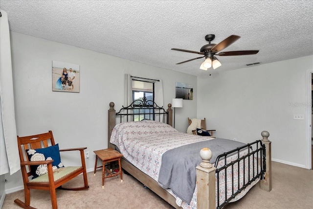 16386 SE 156th Place Rd, Weirsdale, FL 32195 - bedroom featuring carpet, a textured ceiling, a ceiling fan, and baseboards
