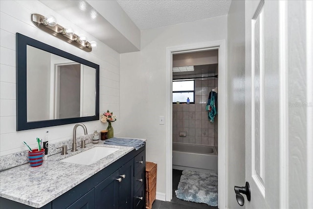 16386 SE 156th Place Rd, Weirsdale, FL 32195 - bathroom with vanity, a textured ceiling, and shower / bath combination