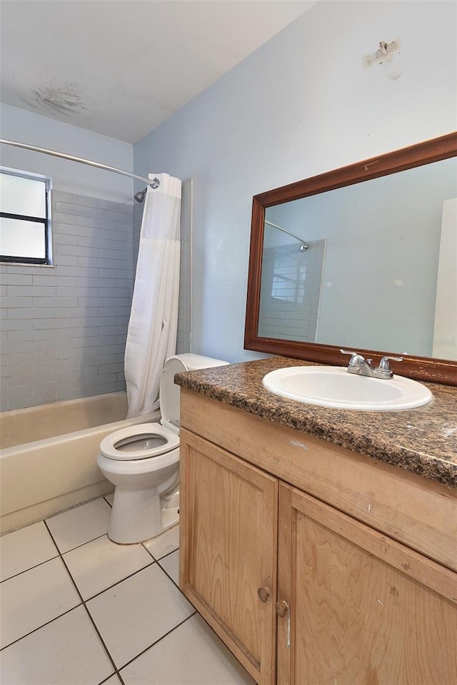 15372 George Blvd, Clearwater, FL 33760 - bathroom with shower / bath combination with curtain, toilet, tile patterned floors, and vanity