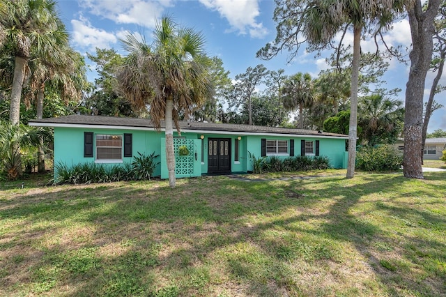 445 Pine Blvd, Merritt Island, FL 32952 - single story home with a front yard and stucco siding
