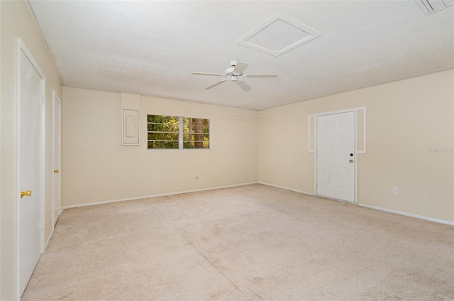 445 Pine Blvd, Merritt Island, FL 32952 - unfurnished room with light carpet, baseboards, and a ceiling fan