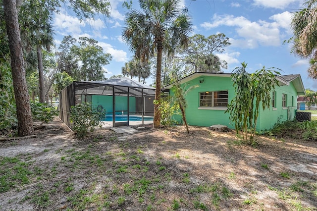 445 Pine Blvd, Merritt Island, FL 32952 - view of yard featuring an outdoor pool and a lanai
