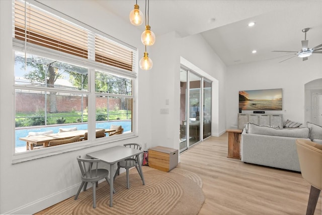 356 Via Tuscany Loop, Lake Mary, FL 32746 - dining space with a ceiling fan, light wood finished floors, recessed lighting, baseboards, and arched walkways