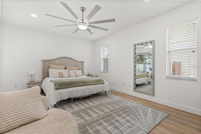 356 Via Tuscany Loop, Lake Mary, FL 32746 - bedroom with wood finished floors, baseboards, and a ceiling fan