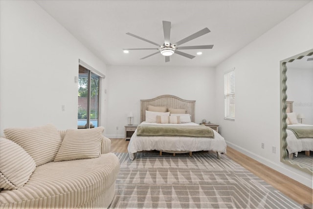 356 Via Tuscany Loop, Lake Mary, FL 32746 - bedroom featuring access to exterior, light wood finished floors, baseboards, recessed lighting, and ceiling fan