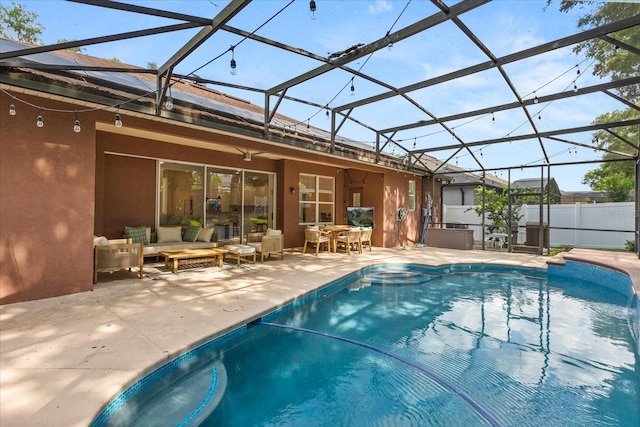 356 Via Tuscany Loop, Lake Mary, FL 32746 - view of swimming pool with an outdoor living space, a patio area, outdoor dining space, glass enclosure, and ceiling fan