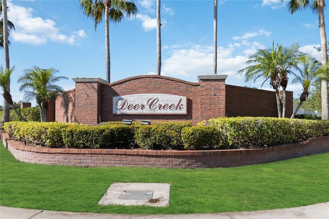 2481 Deer Creek Blvd, Saint Cloud, FL 34772 - community sign featuring a lawn